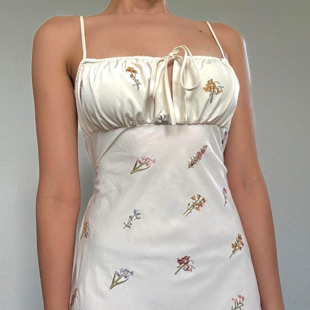 Cream and white embroidered floral maxi dress by WeWoreWhat